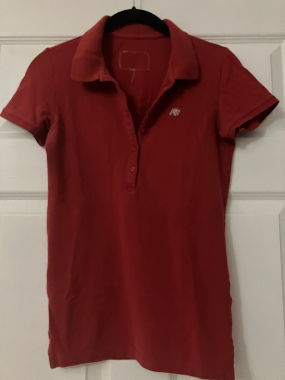 Women's Short Sleeve Polo in Red with Subtle Chest Emblem